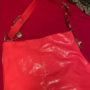 Coral patent leather purse
